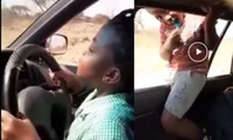 Trẻ em lái xe, trèo ngoài cửa và nóc khi ô tô đang chạyicon