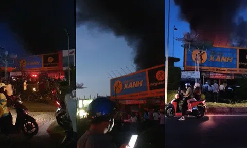 Cháy lớn tại cửa hàng Điện Máy Xanh ở Cần Thơ, nhiều người dân hiếu kì dừng xe theo dõi