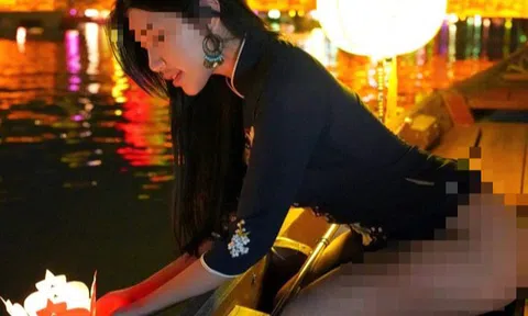 Xôn xao hình ảnh nữ du khách trẻ mặc áo dài "khoe mông" ở Hội An