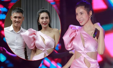 Công Vinh 'chăm sóc' vợ chạy show