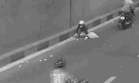 CLIP: Tiền bay khắp hầm chui ở Đà Nẵng, nhiều người nhặt trả cho khổ chủ