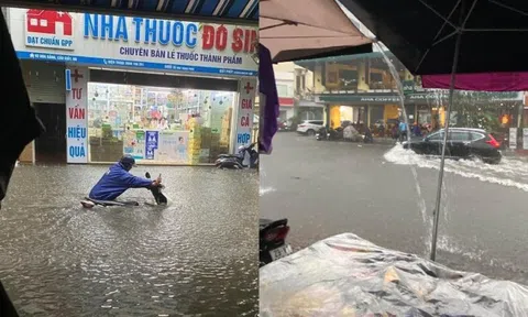 Hà Nội mưa lớn hơn 1 tiếng, đường phố ngập trong "biển nước", giao thông ùn tắc kéo dài