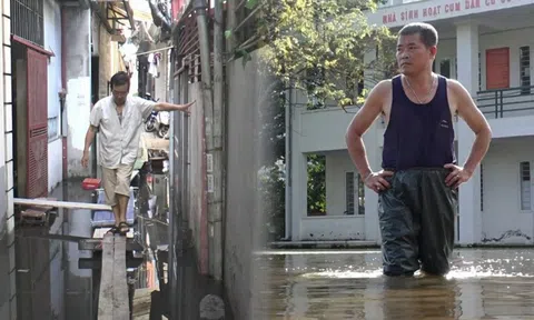 Nước ngập cả tuần, hàng trăm hộ dân giữa thủ đô bắc cầu khỉ để di chuyển