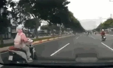 "Cô gái chạy xe máy tạt đầu ôtô trên đường Phạm Văn Đồng" là ai?