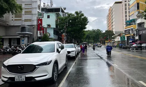 Thu phí ôtô đỗ dưới lòng đường ở TP HCM: Công ty TNXP muốn lui, Sở GTVT không chịu