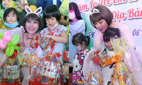 Vợ chồng Việt Hương phát quà Trung thu cho các em nhỏ