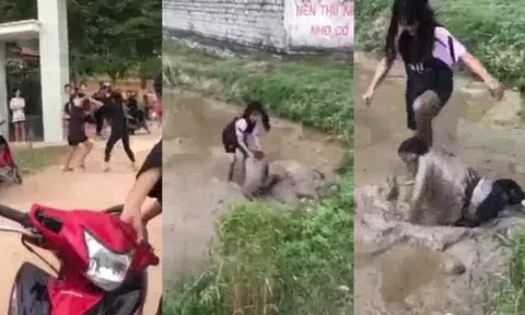 Phẫn nộ cảnh nữ sinh lớp 9 bị bạn cùng trường đánh dã man, nhấn xuống bùn