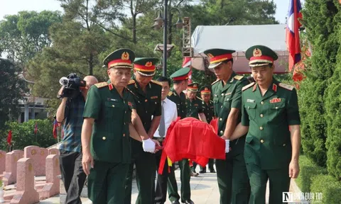 Truy điệu, an táng 96 hài cốt liệt sĩ được quy tập tại Lào