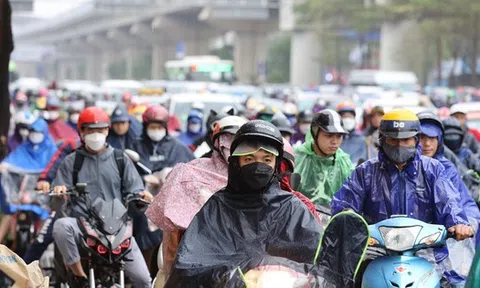 Bão suy yếu thành áp thấp nhiệt đới, miền Bắc mưa kéo dài